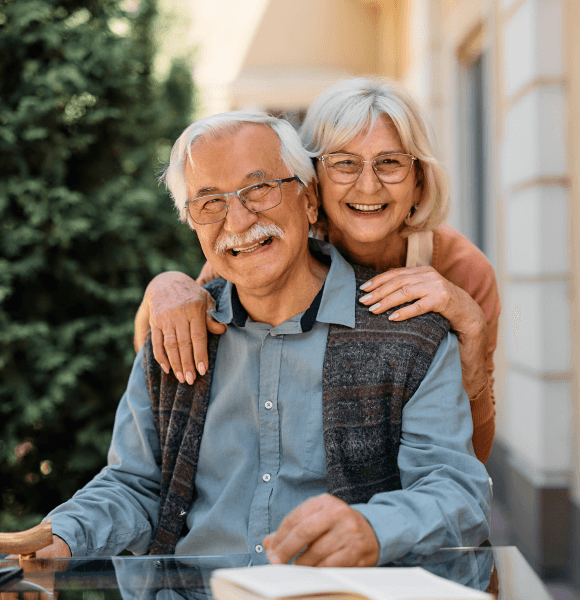 Happy senior couple in a 55+ community managed by SPMG